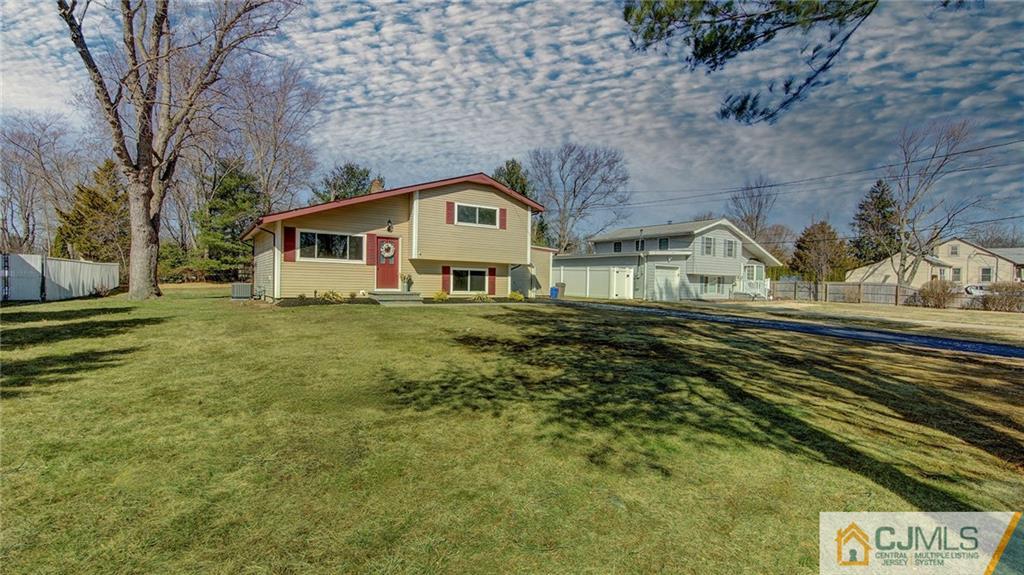 45 Middlesex Road Old Bridge, NJ 07747 - Photo 2 of 35 a house view with a garden space