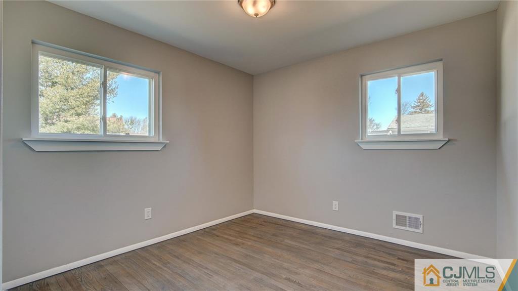 45 Middlesex Road Old Bridge, NJ 07747 - Photo 23 of 35 an empty room with a window