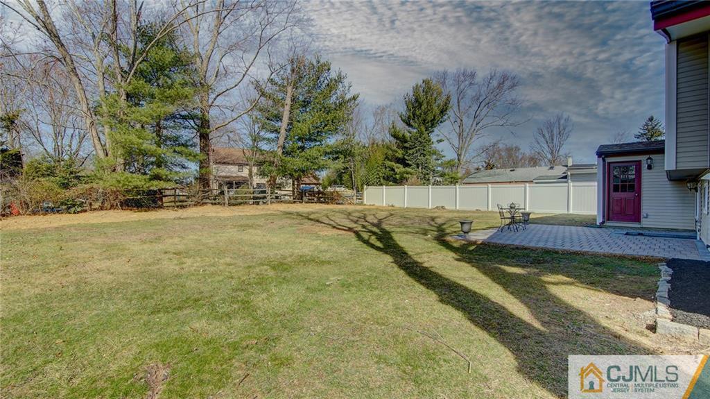 45 Middlesex Road Old Bridge, NJ 07747 - Photo 30 of 35 a view of a swimming pool with a yard