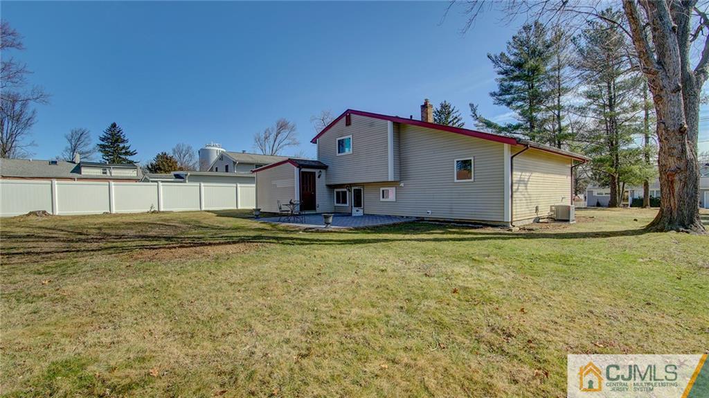 45 Middlesex Road Old Bridge, NJ 07747 - Photo 32 of 35 a house view with swimming pool in front of it