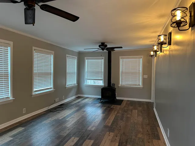 a kitchen with a refrigerator stove and microwave