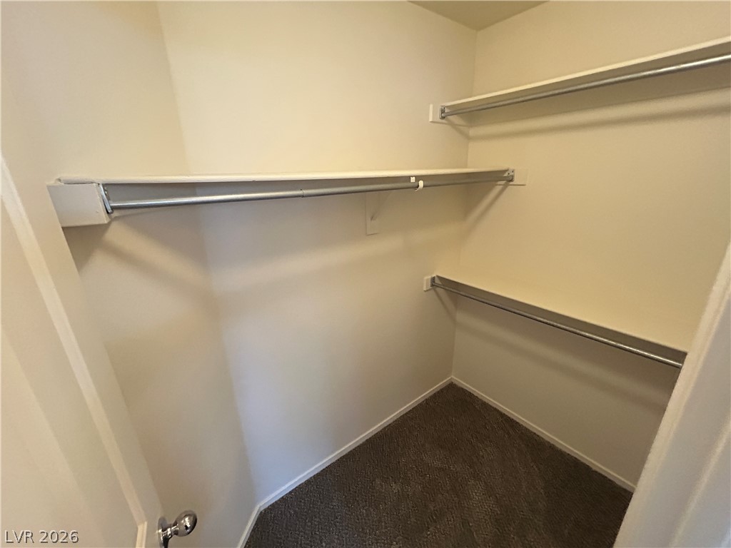 1840 Montvale Las Vegas, NV 89134 - Photo 27 of 31 Functional closet with ample shelving and hanging rods to organize your wardrobe.