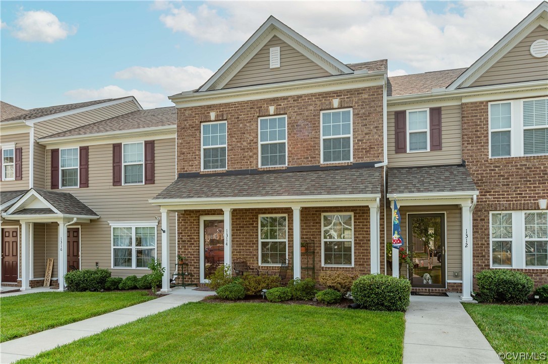 1314 Stone Rdg Pk Loop Henrico, VA 23228 - Photo 1 of 20 Townhome / multi-family property featuring a front yard