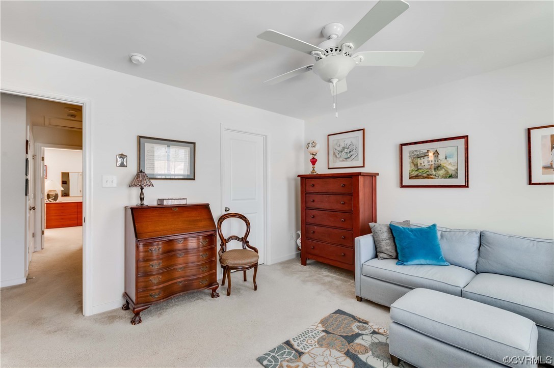 1314 Stone Rdg Pk Loop Henrico, VA 23228 - Photo 3 of 20 Living room with a ceiling fan and carpet