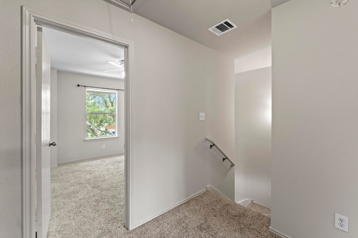 4608 Acers Lane Austin, TX 78725 - Photo 15 of 27 The bright stairwell invites you to the 2nd level where all bedrooms are located.