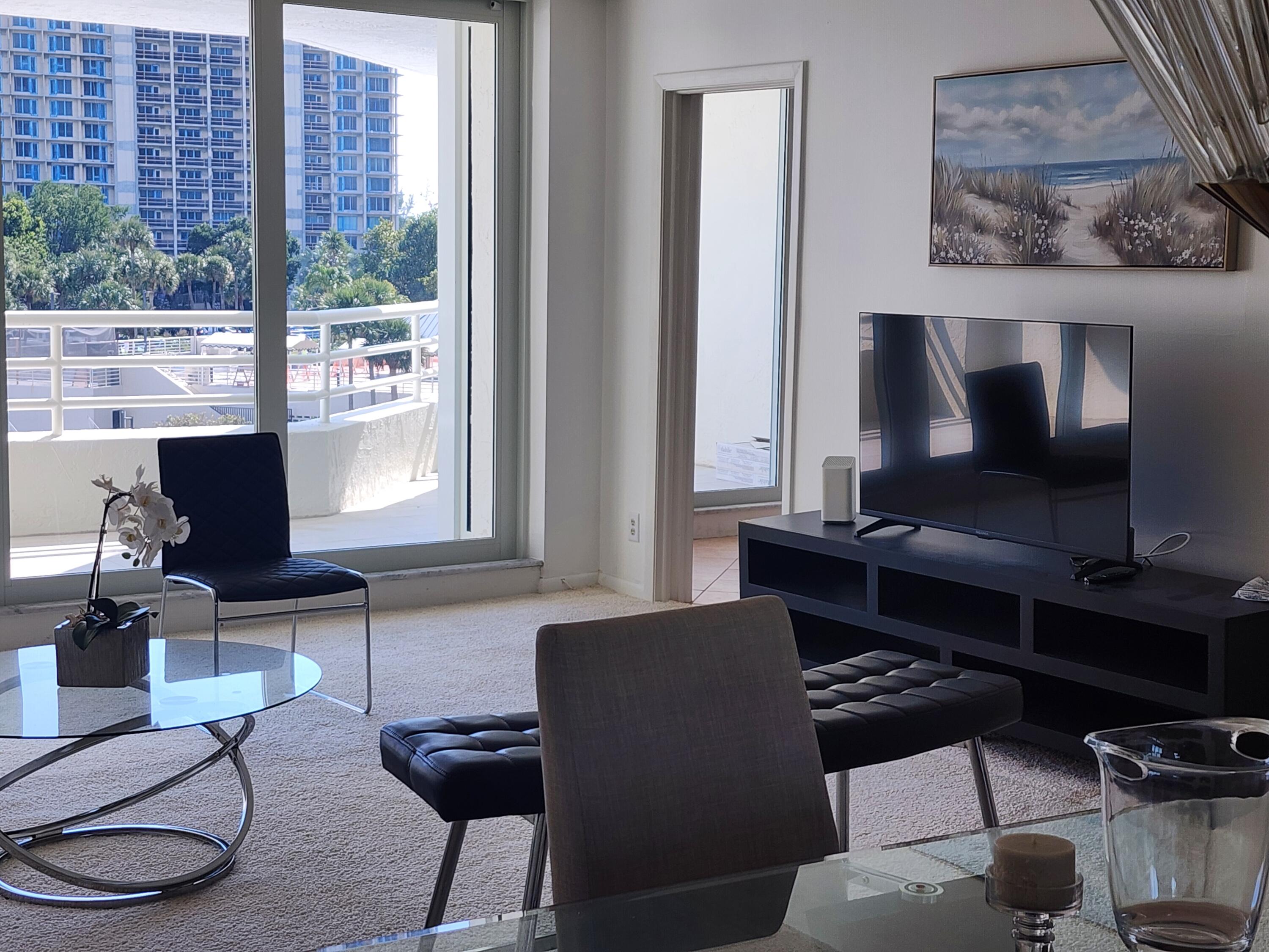 4201 North Ocean Boulevard, Unit 307 Boca Raton, FL 33431 - Photo 23 of 38 a work room with furniture and a window