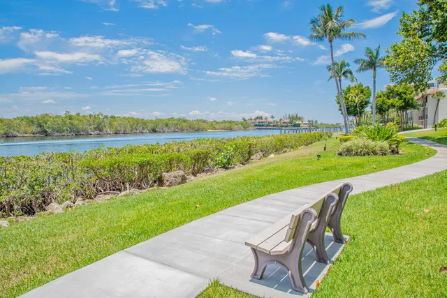 a view of a balcony with chairs