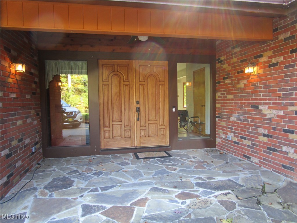 3272 East Smith Road Medina, OH 44256 - Photo 2 of 34 Enter this beautiful home, through wooden double doors and flagstone porch.