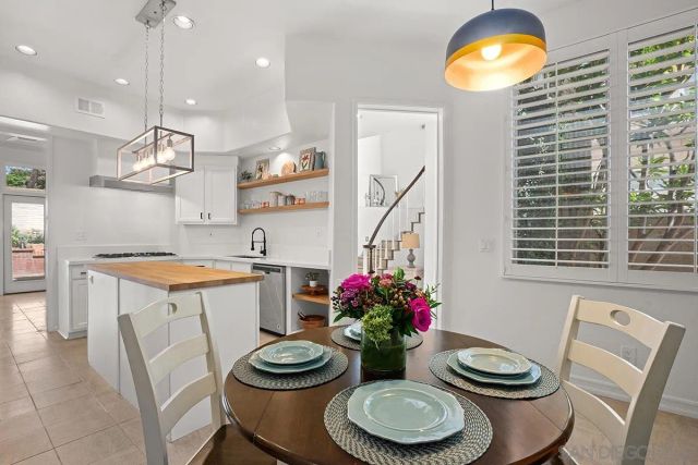 a view of entryway with wooden floor and stairs