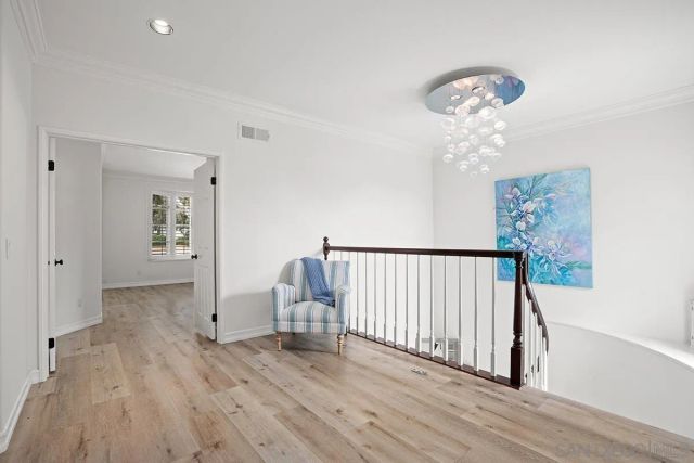 a bedroom with a bed and a fireplace