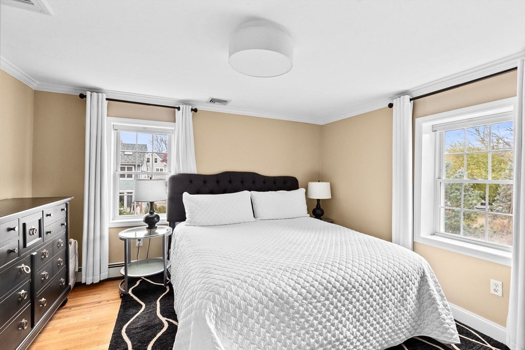 8 Hayes Road Hingham, MA 02043 - Photo 11 of 25 a bedroom with a bed and a window