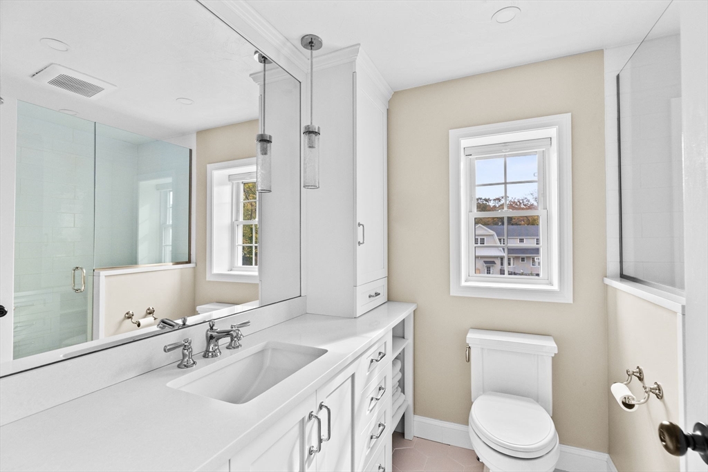 8 Hayes Road Hingham, MA 02043 - Photo 12 of 25 a bathroom with a toilet sink shower and mirror