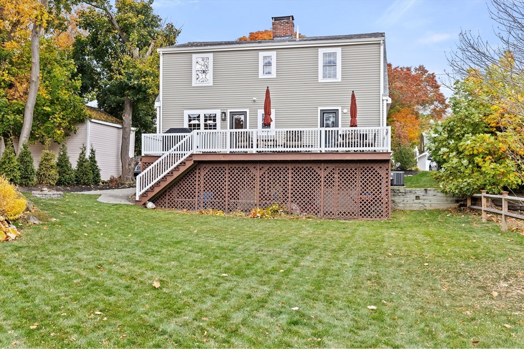 8 Hayes Road Hingham, MA 02043 - Photo 21 of 25 a view of backyard of house with deck and seating area