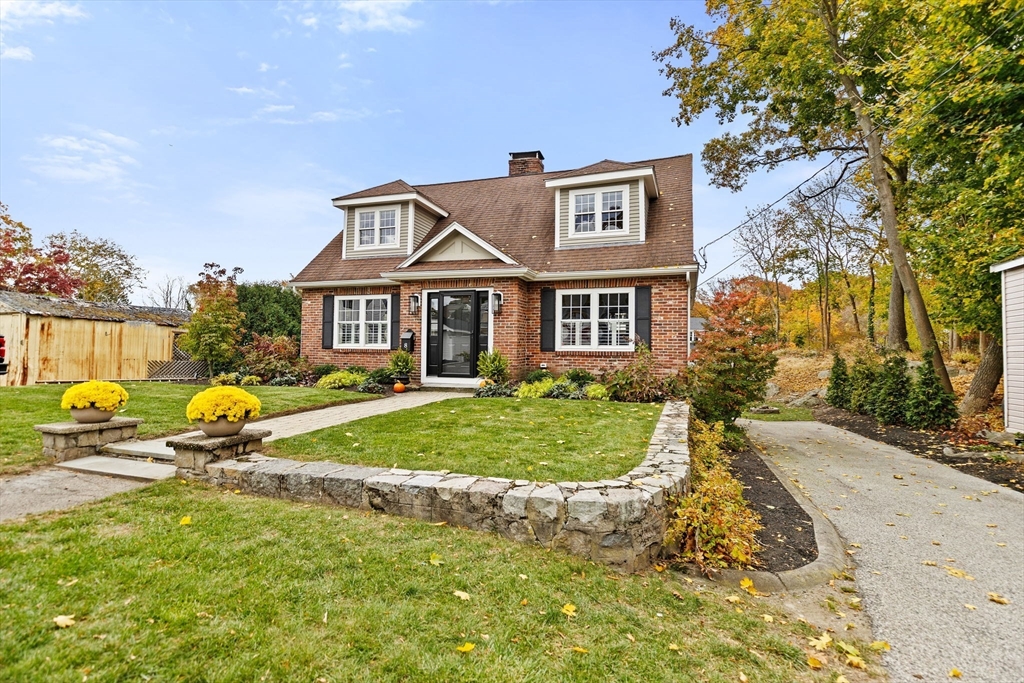 8 Hayes Road Hingham, MA 02043 - Photo 25 of 25 a front view of a house with garden