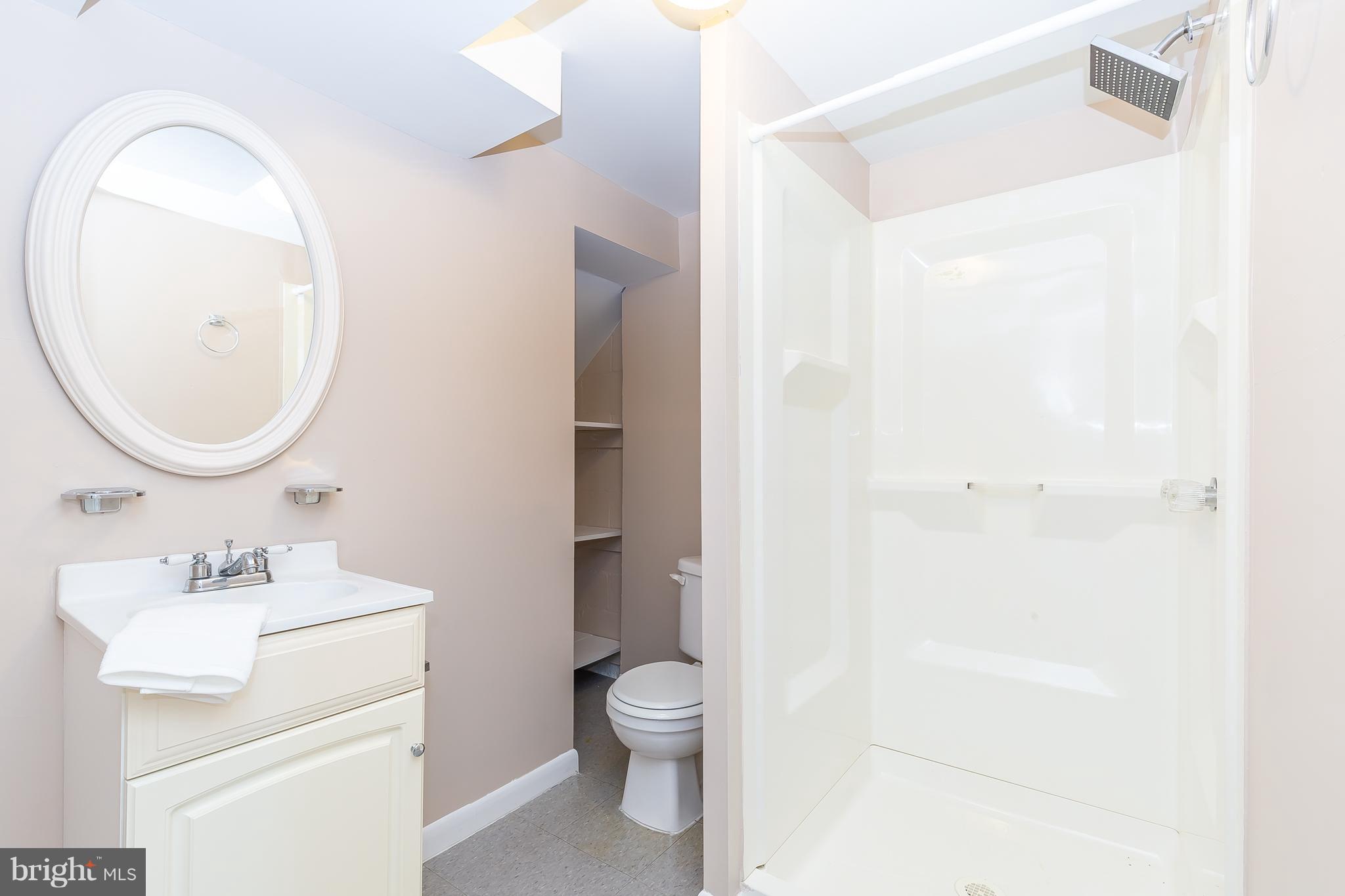 1957 Wareham Road Baltimore, MD 21222 - Photo 26 of 37 Stand-Up shower, rain showerhead, linen closet