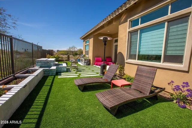 a bench is sitting in the grass