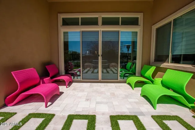 a backyard of a house with seating space