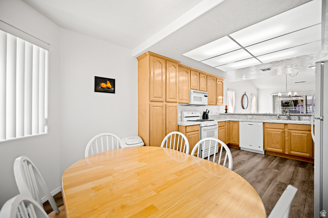 1825 West Mathis Park Place, Unit 46 St. George, UT 84770 - Photo 15 of 45 Dining room with light wood-style floors and suspended lighting