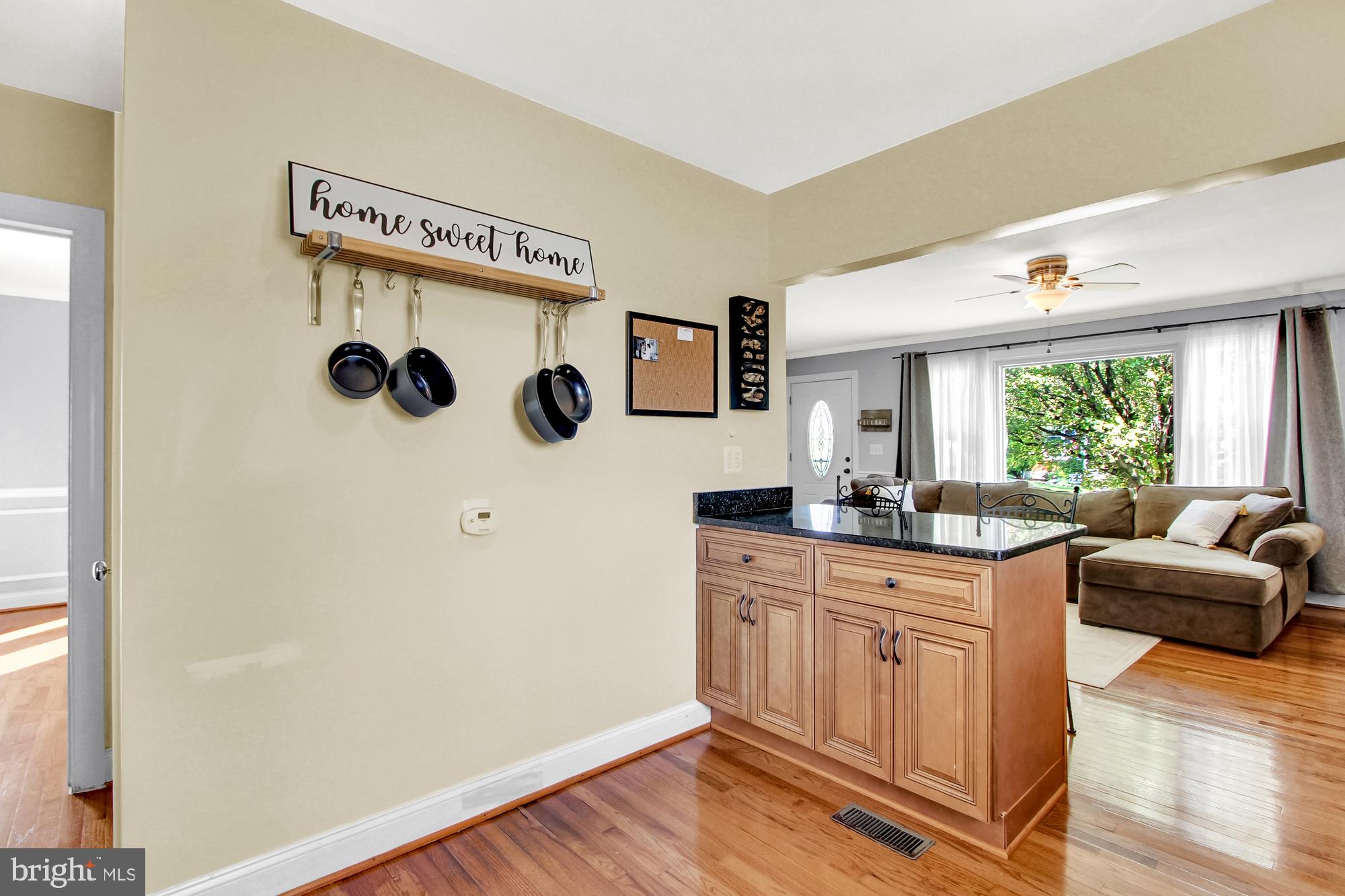 2409 Lakewood Road Baltimore, MD 21234 - Photo 10 of 31 Convenient breakfast bar adjoins the living room