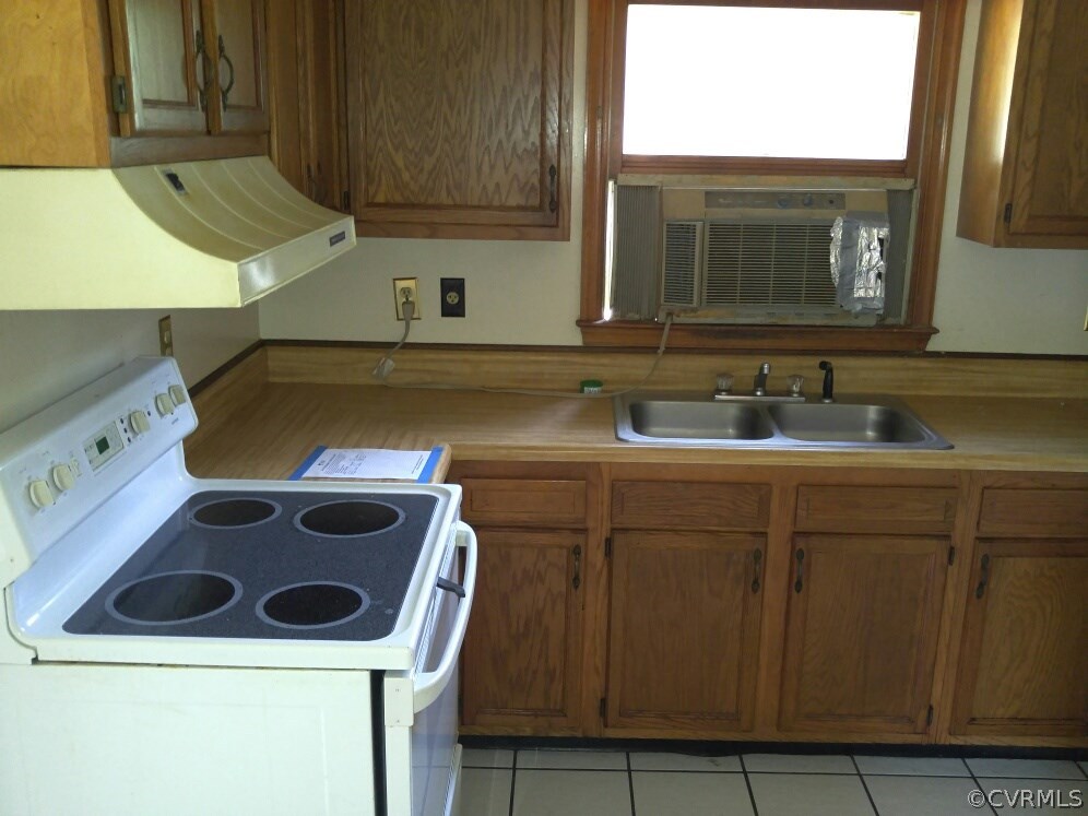 3558 Athey Road Sandy Hook, VA 23153 - Photo 6 of 10 a bathroom with a sink and a washing machine