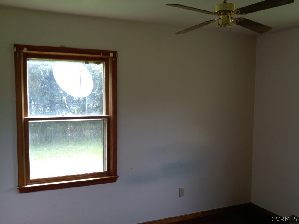 3558 Athey Road Sandy Hook, VA 23153 - Photo 9 of 10 an empty room with a window
