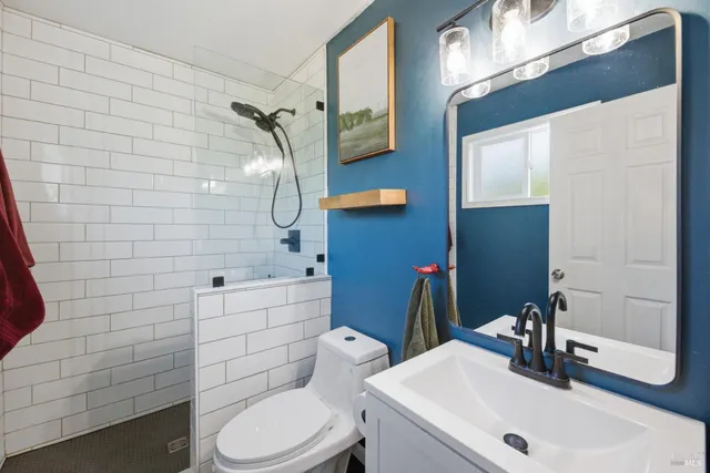 a room with wooden floor and furniture