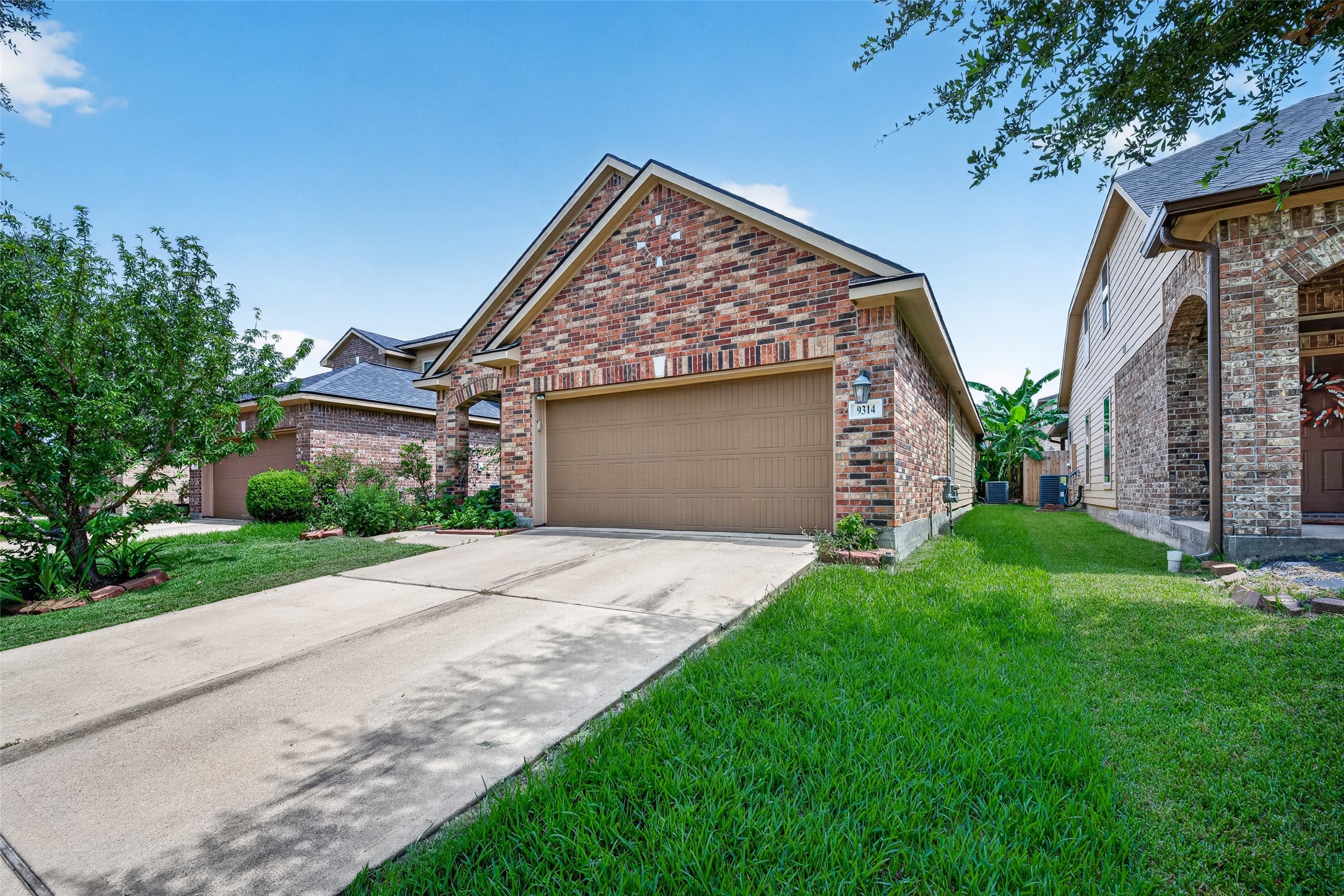 9314 Fuqua Ridge Lane Houston, TX 77075 - Photo 2 of 24 a view of a house with a yard