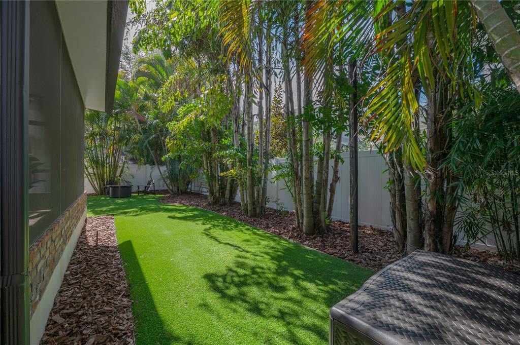 3108 West Villa Rosa Street Tampa, FL 33611 - Photo 49 of 58 a view of a backyard with garden