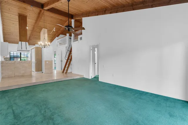 a view of a room with a hanging light