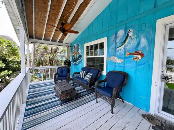 a view of a chairs in wooden deck