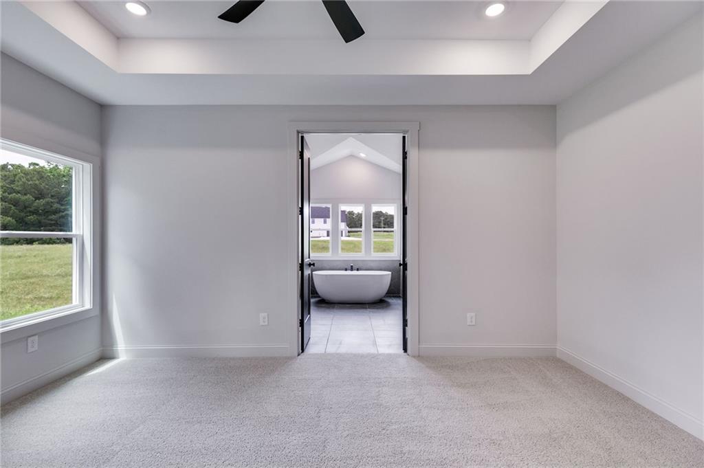 728 Lake Cir Road Buchanan, GA 30113 - Photo 23 of 50 an empty room with furniture and a window