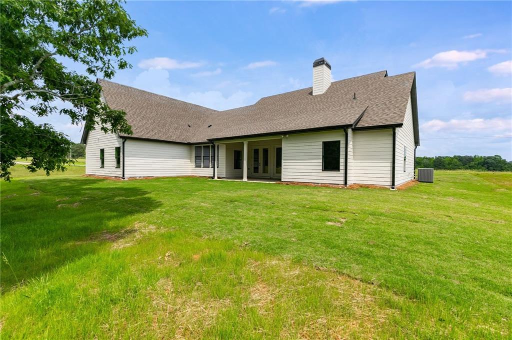 728 Lake Cir Road Buchanan, GA 30113 - Photo 41 of 50 a house view with a garden space