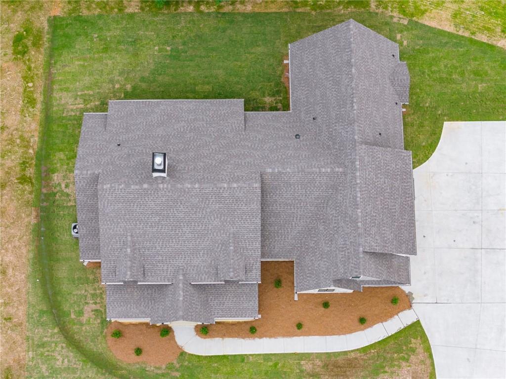 728 Lake Cir Road Buchanan, GA 30113 - Photo 42 of 50 an aerial view of a house with a swimming pool