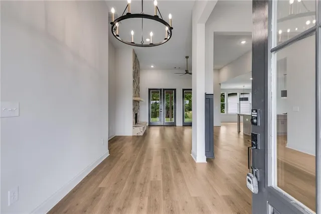 wooden floor in an empty room and a window