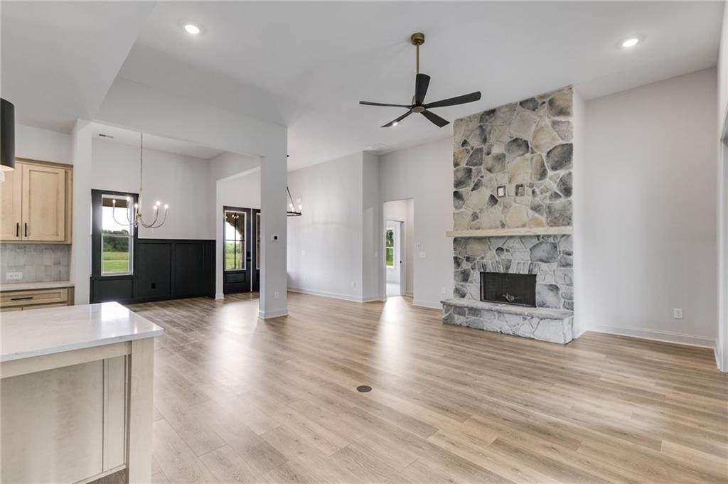 728 Lake Cir Road Buchanan, GA 30113 - Photo 10 of 50 a view of a kitchen with a sink and a fireplace