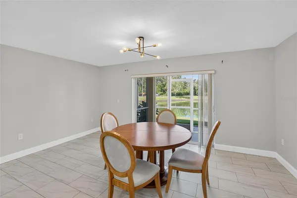 a view of a dining room kitchen and a window