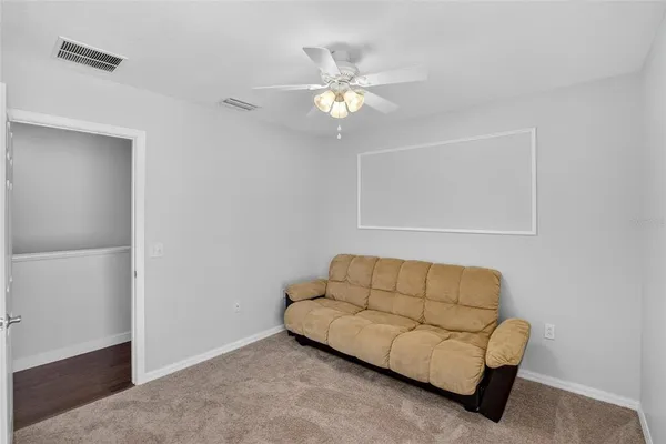 a view of livingroom with workspace