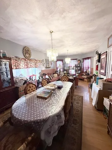 a view of a kitchen and dining area