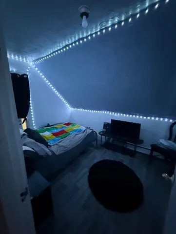 a room with furniture and a chandelier