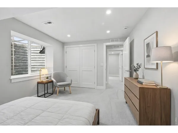 a living room with a couch and a table