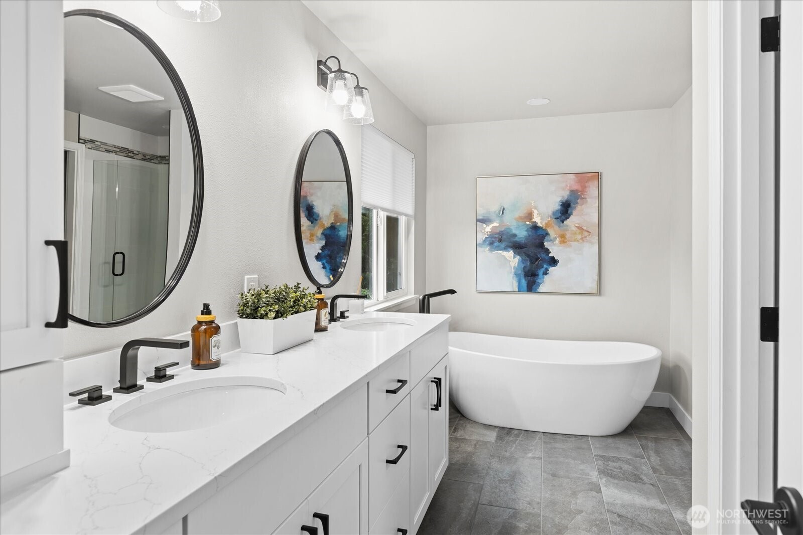 20012 27th Drive Southeast Bothell, WA 98012 - Photo 22 of 39 a bathroom with a double vanity sink mirror and bathtub