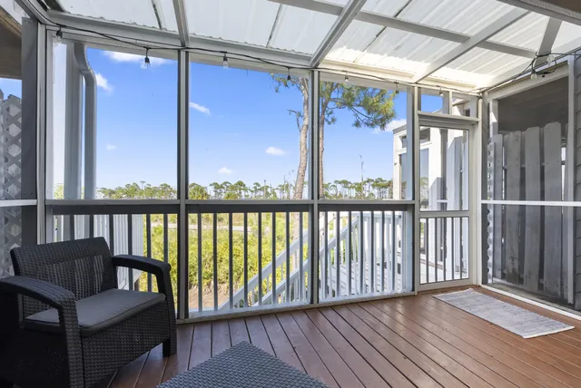 a kitchen with stainless steel appliances granite countertop a sink and a refrigerator