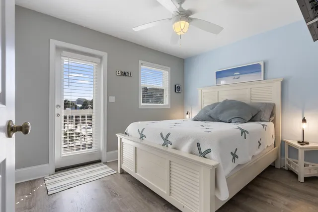 a view of a balcony with chair and wooden floor