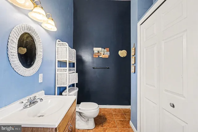 a bathroom with a sink a mirror and a bathtub
