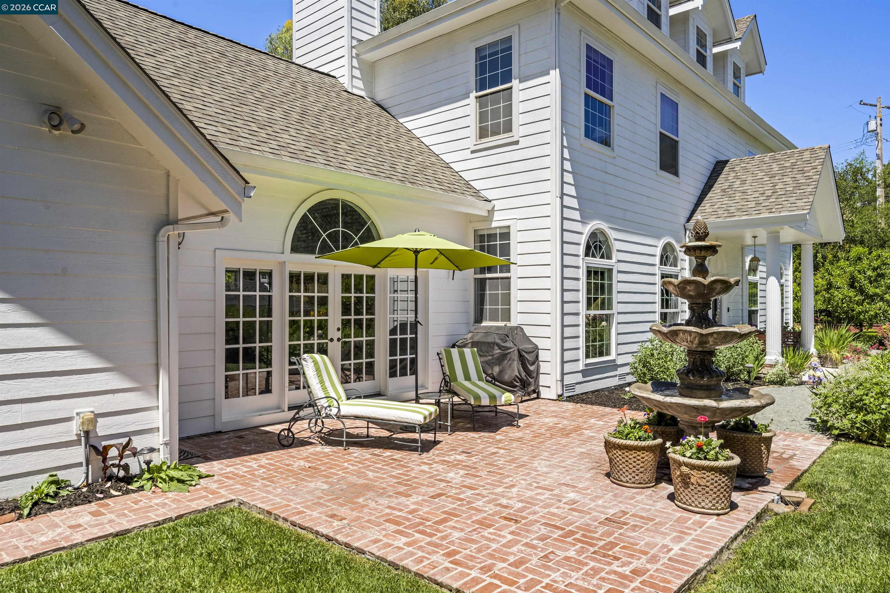 177 Oak Road Alamo, CA 94507 - Photo 63 of 85 a view of a chair and tables in the patio
