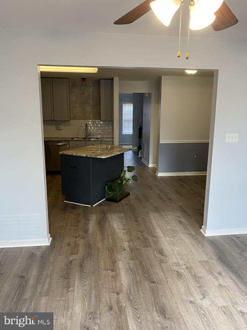 94 Eldon Drive Charles Town, WV 25414 - Photo 12 of 24 a view of living room with granite countertop furniture and fireplace