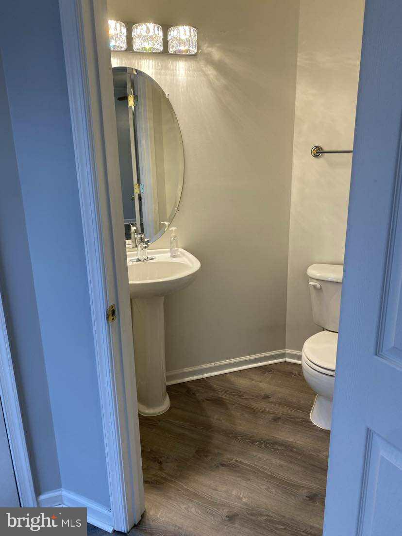 94 Eldon Drive Charles Town, WV 25414 - Photo 15 of 24 a bathroom with a sink and mirror