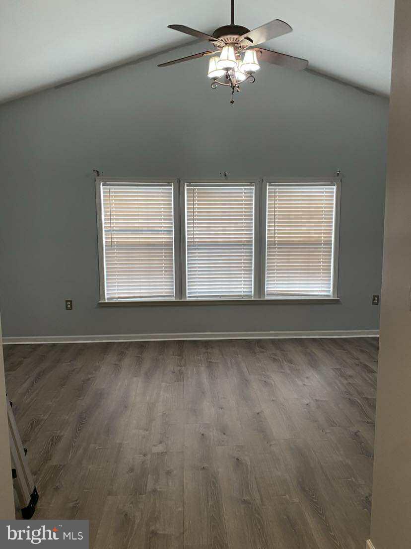 94 Eldon Drive Charles Town, WV 25414 - Photo 17 of 24 a view of a livingroom with a ceiling fan and window