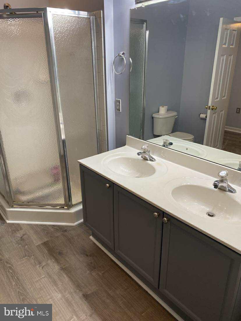 94 Eldon Drive Charles Town, WV 25414 - Photo 19 of 24 a bathroom with a sink and a mirror