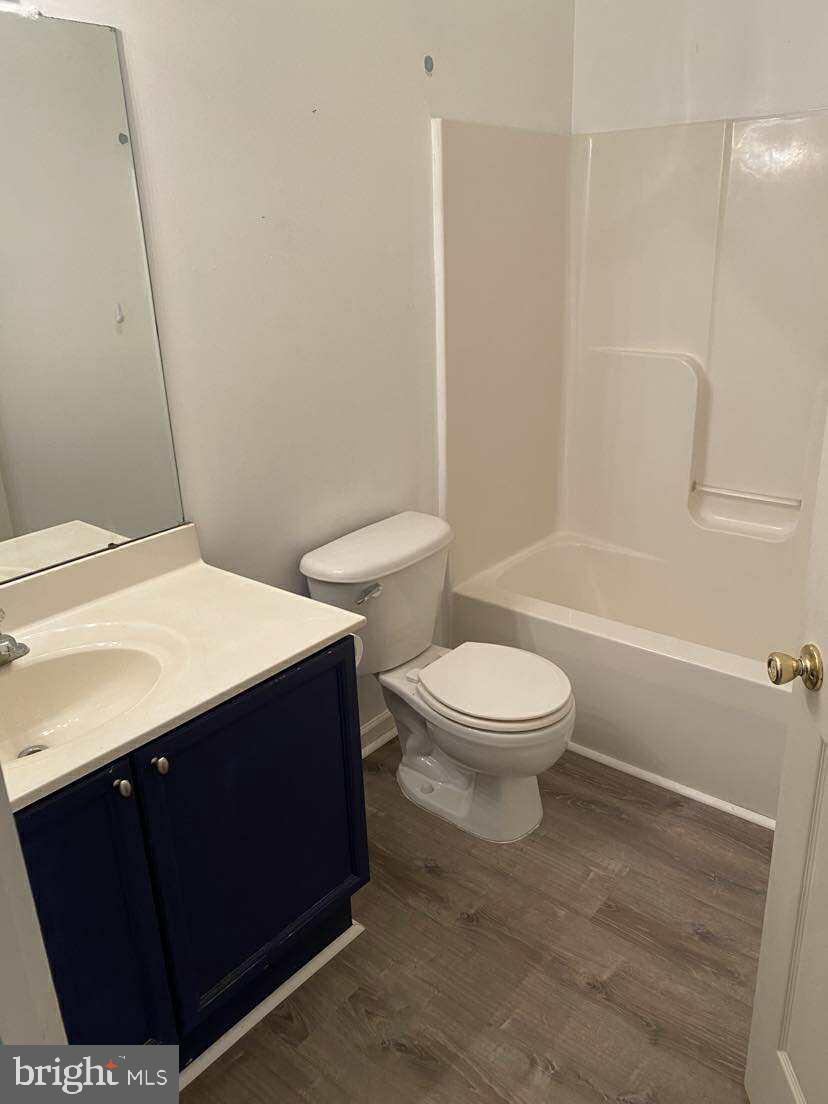 94 Eldon Drive Charles Town, WV 25414 - Photo 24 of 24 a bathroom with a sink a toilet and shower